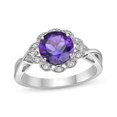 An enchanting design with feminine touches, this amethyst ring is a lovely anytime gift. Fashioned in sterling silver A round-cut amethyst brings bright color to the center Dainty white lab-created sapphires shine in marquise-shaped milgrain frames, creating a scalloped silhouette The slender shank crosses over for an elegant look Luxury Sterling Silver Amethyst Ring With Gemstone Accents, Luxury Amethyst Sterling Silver Ring With Round Stone, Valentine's Day Heart Cut Amethyst Ring In Sterling Silver, Heart-shaped Sterling Silver Amethyst Birthstone Ring, Heart-shaped Sterling Silver Amethyst Ring Gift, Frame Ring, White Lab, Amethyst Ring, Ring Sterling Silver