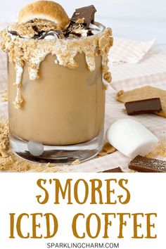 s'mores iced coffee in a glass with marshmallows on top