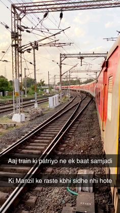 a yellow and red train traveling down train tracks