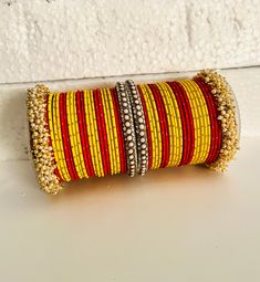 Beautiful traditional bangles red and yellow Color combinations  Material: thread work Size available only 2.6 You can use them for both hand  need any help plz combo me And please visit my shop here at http://etsy.com/shop/designerjewelry2 thank you Handwork Multicolor Bangle Jewelry, Multicolor Handwork Bangle As Gift, Multicolor Handwork Jewelry For Diwali, Festive Multicolor Handwork Bangle, Festive Multicolor Handwork Jewelry, Handwork Bracelets For Festivals, Festive Thread Bangle Bracelets, Multicolor Handwork Bracelets As Gift, Festive Thread Bangle Jewelry