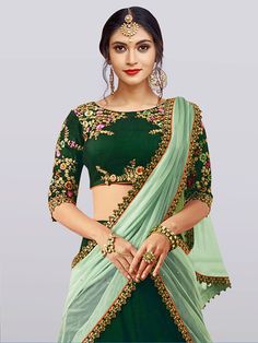 Showcase your best ethnic look with this mesmeric "dark green embroidered taffeta silk bridal lehenga choli" for women. Crafted from exquisite green color taffeta silk material, this lehenga exudes elegance and grace. The intricate dori work, zari work, and thread embroidery add a touch of opulence, making it a perfect choice for weddings, engagements, ethnic wear, evening events, and other special occasions.
The set includes a beautiful lehenga, a choli, and a net dupatta, all adorned with matc Semi-stitched Green Embroidered Fabric, Bollywood Green Lehenga With Intricate Embroidery, Green Lehenga With Intricate Embroidery For Festive Occasions, Festive Green Lehenga With Intricate Embroidery, Designer Green Choli With Intricate Embroidery, Green Unstitched Lehenga With Intricate Embroidery, Unstitched Green Lehenga With Intricate Embroidery, Green Saree Set With Intricate Embroidery, Traditional Green Lehenga With Intricate Embroidery