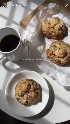 three cookies on a plate next to a cup of coffee and napkins with the words, your story som chocolate and walnut