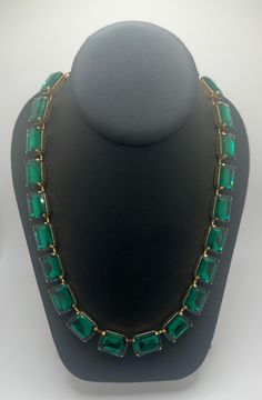 A very high end luxurious piece! The necklace features 21 Swarovski Crystals in emerald green 18x13 octagon (emerald cut)  stones. The setting is gold plated. This is most definitely a statement necklace, in the Anna Wintour style. Perfect for May birthdays (emerald birth stone) or holiday parties or really any event where you want your jewelry to stand out.  This listing is for one necklace, I included photos of some other pieces just for fun. This one stands alone beautifully, but you can layer it to go extra bold. I can make matching earrings and bracelet  for you, just message me. ❤️💎 May Birthdays, Anna Wintour Style, May Birthday, Anna Wintour, Just For Fun, Emerald Cut, Matching Earrings, Swarovski Crystal, Emerald Green