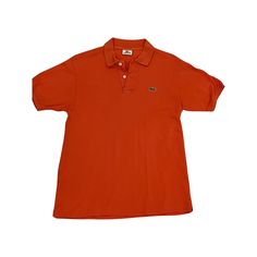 Get your street style on with this vintage Lacoste orange polo t-shirt! Unleash the vibrant spirit of authentic Lacoste fashion in bold, bright orange. Elevate your look and turn heads wherever you go  it's more than just a shirt, it's a statement!  TAG READS: Lacoste, size 4, Devenlay, Made in France, 100% Cotton Keep in mind vintage tag sizes vary from modern day sizing. MEASUREMENTS   (Taken in inches lying flat are approximately) LENGTH: 27 inches Measure from top to bottom. SHOULDERS: 18 in Y2k Streetwear Fashion, Orange Y2k, Lacoste Vintage, Polo Orange, Vintage Lacoste, Etiquette Vintage, Polo Lacoste, Orange Orange, Vintage Polo