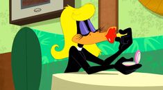 a cartoon character sitting on a table with a cup in her hand