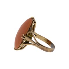 An irresistible deep salmon hue, this cabochon cut Victorian coral ring is calling to you. Made from 18k yellow gold, the filigreed basket holds the coral in place with fun double claw prongs. Currently the ring is a size 5, but can be adjusted to a number of sizes for a small fee. Baraka Gems is committed to sustainable jewelry practices. We purchase & sell strictly antique & vintage coral. Baraka Gems does not support new coral harvests. Estate Wedding Ring, Estate Rings, Ring Shank, Gem Diamonds, Claw Prong, Coral Ring, Contemporary Ring, The Coral, Sustainable Jewelry