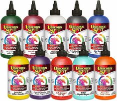 twelve different colors of unicorn spirit paint in various shapes and sizes, including one for each color