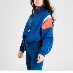 Nike Sportswear Heritage Wind Jacket & Leggings: -Sold Out Everywhere -Leggings Are A Size Large -Jacket Is A Size Medium -Sold As A Set Or Separately -Jacket Can Be Shorter W Drawstring -Teal Blue Color & Pink -100% Authentic -100% Brand New With Tags Please Feel Free To Ask Questions And Kindly Take A Look At My Other Designer Items Listed, Thanks! Blue Athleisure Tracksuit For Fall, Nike Fall Track Jacket For Workout, Nike Tracksuit For Gym In Winter, Blue Long Sleeve Track Jacket For Jogging, Blue Long Sleeve Windbreaker In Athleisure Style, Nike Blue Track Jacket For Spring, Blue Track Jacket For Sports In Spring, Blue Track Jacket For Spring Sports, Nike Sportswear Tracksuit For Sports