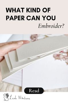 someone is holding up some white cards with the words what kind of paper can you embroider?