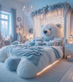 a white teddy bear sitting on top of a bed in a room with christmas decorations