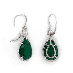 Handcrafted drop dangling platinum earrings with large pear cut green emeralds 26.82 ct in total from Zambia. Green emerald stones are Certified. Pear cut white diamonds are 0.68 ct in total. Smaller accent round diamonds are 2.0 ct in total. Diamonds are all natural and white in G-H Color Clarity VS. Lever back earrings. Width: 1.5 cm Height: 4.5 cm Weight: 17.5 g Green Teardrop Diamond Earrings Fine Jewelry, Green Teardrop Diamond Earrings, Luxury Green Teardrop Earrings, Luxury Pear-shaped Emerald Earrings, Formal Green Sterling Silver Teardrop Earrings, Pear-shaped Emerald Green Earrings, Formal Green Teardrop Sterling Silver Earrings, Green Sterling Silver Teardrop Earrings For Formal Occasions, Formal Green Teardrop Gemstone Earrings