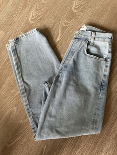 an image of a pair of jeans on the floor