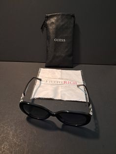 Pair of Guess sunglasses and bag. Size and condition pictured Trendy Sunglasses With Tinted Lenses For Everyday, Elegant Tinted Sunglasses For Everyday Use, Elegant Tinted Lenses Sunglasses For Everyday Use, Black Tinted Sunglasses For Everyday Use, Guess Sunglasses, Eyewear Sunglasses, Sunglasses Accessories, Etsy Accessories, Bathing Beauties