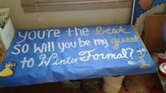 a blue sign that says you're the best so will you be my guest to winter formal?