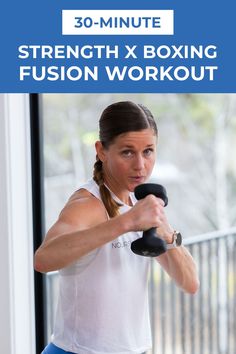 a woman is exercising with dumbbells and the text 30 - minute strength x boxing fusion workout