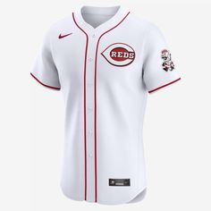 Featuring the official on-field design of your favorite MLB squad, this Cincinnati Reds Jersey delivers an authentic look with premium team details. The sweat-wicking, stretch mesh fabric helps provide a breathable, comfortable feel on game day. Sporty White Baseball Jersey For Fans, White Varsity Baseball Jersey With Moisture-wicking, White Moisture-wicking Baseball Jersey For Sports Fans, Sporty White Baseball Jersey With Moisture-wicking, Sporty White Moisture-wicking Baseball Jersey, White Moisture-wicking Sporty Baseball Jersey, Nike Team Spirit Baseball Jersey With Team Logo, Collegiate White Baseball Jersey For Sports, White Baseball Jersey For Baseball Season