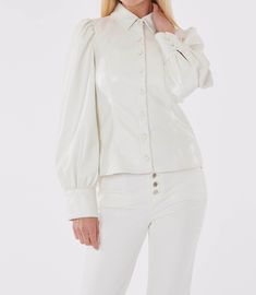 Upgrade your style with our Faux Leather Button-Up Shirt with Puff Sleeves. This premium faux leather shirt boasts elegant puff sleeves that add a touch of sophistication to any outfit. Available in a range of versatile neutrals and delicate pastel colors, it's a versatile piece that effortlessly enhances your fashion game. Stay chic and on-trend with this stylish faux leather shirt. Faux leather Puff sleeves Button up Available in Black, White, Soft Pink, Yellow, and Light Blue Hand wash cold a White Puff Sleeve Blouse With Button Cuffs, Chic Fitted Puff Sleeve Button-up Top, Chic Button-up Puff Sleeve Top, Elegant Puff Sleeve Button-up Top, Leather Puff Sleeve Shirt, Leather Button Up, Leather Shirt, Puff Sleeve Top, Soft Pink