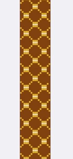 a brown and yellow rug with squares on the bottom, along with two rows of horizontal lines that are parallel to each other