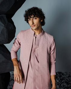 Effortlessly chic, this subtle shrug set features scattered embroidery all over the jacket, perfectly paired with a matching kurta and pants. The ensemble strikes a harmonious balance between understated elegance and modern style, making it an ideal choice for refined occasions. Kurta With Jacket, Pink Shrug, Kurta And Pants, Kurta Pants, Modern Mens Fashion, Clothing Guide, Indian Men Fashion, Vacuum Storage, Rosé Brown