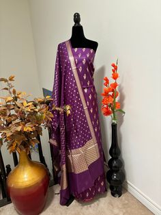 handloom  pure Silk Banarasi suite/Dress meterial fits to all sizes Mehindi Green color  Beautiful Floral pallu. gold zari Butta all over the top. we provide lining as well  this is 3 pieces dress UNSTITCHED METRIAL Purple Unstitched Suit With Traditional Drape, Purple Art Silk Unstitched Suit With Dupatta, Purple Chanderi Unstitched Suit For Diwali, Unstitched Purple Suit For Navratri, Purple Unstitched Suit With Pallu For Navratri, Purple Unstitched Suit With Dupatta For Diwali, Festive Purple Self Design Unstitched Suit, Traditional Drape Purple Unstitched Suit For Festivals, Purple Unstitched Suit For Festivals