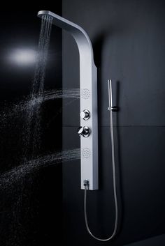 a shower head with water coming out of it