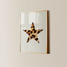 an animal print star hangs on the wall