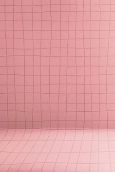 a pink wall with some lines on it