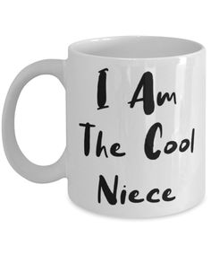 i am the cool niece coffee mug with black writing on it and an inscription that reads,