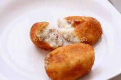 three fried food items on a white plate