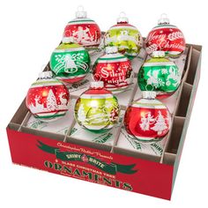 twelve christmas ornaments in a box