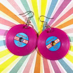 Magenta Vintage Disco Record Charm Earrings Nos-Vintage Charms-Record Earrings-Kitschy Jewelry-Music-Retro-Disco Music-Dangly-Colorful-Sock Hop Earrings Measure 2" Long From Top Of Ear Wire. Records Are 1.5" Plastic Nos Vintage Record Charms From Hong Kong. All Of My Items Are Either One-Of-A-Kind, Vintage, Gently Worn Or Made In Very Limited Quantities, So If Something Catches Your Eye, Snap It Up Before Someone Else Does. Retro Round Earrings For Party, Retro Party Earrings, Vintage Purple Drop Earrings, Vintage Pink Nickel-free Earrings, Nickel-free Purple Earrings For Party, Retro Dangle Jewelry, Retro Purple Jewelry For Gifts, Vintage Purple Earrings For Party, Retro Pink Earrings For Party