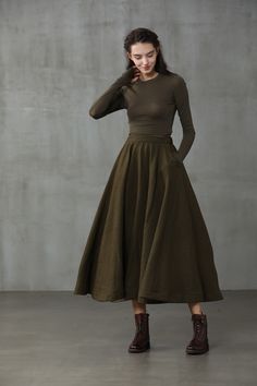 "Introducing our flattering wool skirts. Winter days do not mean that you need to resign to elegance. Boasting a soft wool-blend construction, this spiral skirt from Linennaive proves that you can be elegant and warm at the same time. Featuring a high waist, a elastic waist with rear zip fastening, a flared style, side pockets and a midi-length. 【Material】 -Wool 87%, Elastane 13% 【Length】 32-33 inches. 【Size】 *SIZE XS length: 32\"/82 cm waist: 26\"/ 66 cm *SIZE S length: 32\"/82 cm waist: 27\"/ Flowy Full Maxi Skirt For Fall, Lined Long Maxi Skirt For Fall, Voluminous Lined Maxi Skirt For Fall, Fall Full Lined Maxi Skirt, Fall Pleated Full Skirt, Fall Midi Voluminous Skirt, Fall Voluminous Skirt, Fall Voluminous Midi Skirt, Fall A-line Gathered Maxi Skirt