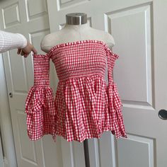 Smock Baby Doll Top With Off The Shoulder Sleeves New With Tags Cute Gingham Long Sleeve Tops, Cute Red Tops For Vacation, Red Sleeveless Top For Picnic, Red Summer Tops For Picnic, Red Smocked Top With Ruffles For Summer, Red Vacation Top With Smocked Back, Red Smocked Back Top For Vacation, Red Tops With Smocked Back For Vacation, Red Smocked Back Top For Beach