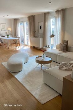 the living room is clean and ready for guests to use it as a dining area