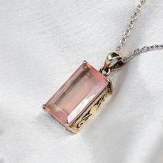 Rose Quartz Baguette Shape Women's Pendant With Moissanite Accents Caliber Size Silver Pendant For Women| Gift For Wife/Anniversary Gift. Embrace the enduring beauty and tranquil energy of the Enchanting Rose Baguette Shape Pendant, featuring exquisite rose quartz cut stone caliber size. This pendant is a timeless emblem of love and serenity, evoking feelings of warmth, compassion, and inner peace. At the heart of the pendant lies a stunning rose quartz, meticulously cut to reveal its natural beauty and delicate pink hue. The soft, rosy tones of the rose quartz symbolize love, compassion, and emotional healing, making it a cherished gemstone that resonates with the heart and soul. Crafted with precision and care, the pendant showcases the natural elegance of the rose quartz in a sleek and Elegant Rose Gold Jewelry With Rectangular Stone, Rose Gold Baguette Cut Necklace For Gift, Rose Gold Jewelry With Rectangular Stone For Gift, Rose Gold Baguette Cut Jewelry Gift, Elegant Morganite Jewelry As A Gift, Elegant Rectangular Necklace For Mother's Day, Diamond Cut Morganite Jewelry Gift, Morganite Jewelry With Diamond Cut As Gift, Gift Diamond Cut Morganite Jewelry