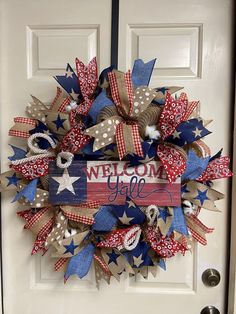 Handcrafted Texas Wreath, Welcome Texas, Country Farmhouse Decor,  Patriotic Wreath, Cowboy Wreath, Front Door Wreath, Gift Item, Kitchen Wreath Howdy Folks! Welcome your guests and family with the rustic charm of our Texas Welcome Wreath.  This 24-inch deco mesh wreath is meticulously handcrafted using high-quality materials.  The wreath features a combination of vibrant deco mesh, quality wired ribbon, cream and white roping, and delightful cotton attachments which is the state crop, (just a little history  thrown in!) all carefully arranged to create a stunning focal point.  Hang it on your front door, in your office, or kitchen to instantly add a touch of warmth and elegance to any space.  Our Texas Welcome Wreath embodies the country and farmhouse style, making it a perfect choice for Texas Wreath, Cowboy Wreath, Cowboys Wreath, Kitchen Wreath, Texas Country, Wreath Front Door, Patriotic Wreath, Welcome Wreath, Country Farmhouse Decor