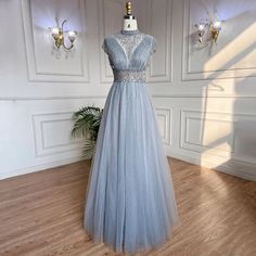 Majestic Mist: 2024 Grey High-Neck A-Line Beaded Long Evening Gown Elegance Wedding, Grey Palette, High Neck Designs, Long Evening Gowns, 2024 Wedding, British Indian, Modern Fashion, Neck Collar, Wedding Season