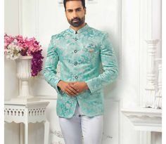 "This is a Classic Jodhpuri suit by Golden Attire crafted from high quality fabric and imported materials. Our products are handcrafted by experienced tailors who make sure the that the stitching is precise, lining is proper and the overall product is sturdy enough to not go out of shape for more than a few years. Also all our products have extra margins in their length, sleeves, sides so it's easily alterable if your size changes after some time. To see more available colours and designs in this collection, Check out the 'Classic Two Piece Suits' Section. *This is a Jodhpuri suit of a jacket and a trouser. *We also offer customization so we can provide you an even better fit if you massage us your measurements (in inches) of Chest, Stomach, Waist, Hip, Shoulder and Actual Height after ord Luxury Green Bandhgala For Wedding, Traditional Green Semi-formal Sets, Nehru Jacket For Groom At Eid, Green Long Sleeve Tuxedo For Wedding, Green Nehru Jacket For Wedding Diwali, Festive Nehru Jacket For Groom, Festive Suits For Grooms, Bandhgala For Groom On Eid, Bandhgala For Groom Eid Celebration