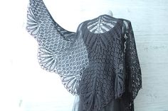 "Black lace shawl with fringes hand knitted from soft  merino wool . Lovely accent for Bohemian, Gothic, Witches and  Dark mori clothes *size- length 28\" without fringes, and about 35,4\" with fringes width 60\" *Soft merino wool yarn *Custom colour available! *gentle hand wash, lay flat to dry  It's perfect accessory to dress up your little black dress or  white dress.   this shawl in other colors you can see here: https://www.etsy.com/listing/453087690  https://www.etsy.com/listing/455719960  https://www.etsy.com/listing/520040654    https://www.etsy.com/listing/520850451" Goth Witch Aesthetic, Goth Witch, Dark Mori, Hand Knit Shawl, Mori Fashion, Black Shawl, Fringe Shawl, Bridal Shawl, Shoulder Wrap