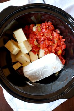 the food in the slow cooker is ready to be cooked and put into the crock pot