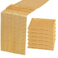 gold glitter table runner and placemats on a white background with space for text