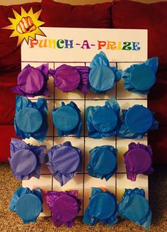 a bunch of purple and blue cupcakes are on a board with the words punch - a - razzle