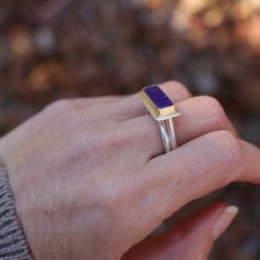 The Monument ring design was inspired by my Coil rings; I wanted to expand on the shape, incorporate height and be able to create a surface for adding stones, or another layer on top. I love the lightness this piece has, the shape and open space make for a balanced design that is substantial without feeling overpowering. One of a kind Sterling silver 18k yellow gold bezel Size 7 Handmade in Joshua Tree, CA by Sierra Keylin Modern Sterling Silver Rings With Rectangular Stone, Unique Sterling Silver Ring With Rectangular Stone, Modern Amethyst Ring With Bezel Setting, Contemporary Gemstone Rings For Gifts, Contemporary Gemstone Rings For Gift, Modern Amethyst Ring As Gift, Modern Sterling Silver Amethyst Ring, Modern Rectangular Gemstone Ring, Hand Forged Modern Rings As Gifts