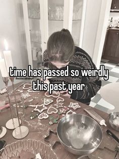 a woman sitting at a table with some cookies on it and the words time has passed so weirdly this past year