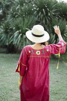 "Vintage Mexican Maxi Dress with Floral Hand Embroidery in Shade of Ruby Red. Features hand embroidered flowers on chest front, neck and sleeves. Half Sleeve drawstring at cuff sleeves. Cotton Blend Polyester Condition: Very Good Vintage Condition. BEST FIT = M Please be sure to check the measurements to insure a perfect fit. Details and Measurements (Inch) BUST: 38 \" HIPS: 46 \" FULL LENGTH: 56 \" SLEEVE LENGTH: 14 \" Our model is 165 cm height 52 kg weight 33 bust 27 Waist 35 Hip in inch **FR Peasant Floral Embroidered Top For Beach, Red Floral Embroidered Beach Dress, Red Floral Embroidered Dress For Festival, Red Bohemian Embroidered Dress With Floral Details, Peasant Long Sleeve Embroidered Top For Beach, Red Bohemian Dress With Floral Embroidery, Long Sleeve Floral Embroidered Top For Beach, Peasant Style Long Sleeve Embroidered Top For Beach, Red Embroidered Dress With Floral Detail For Festival