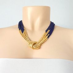 Navy blue and gold necklace. Size shown is 18". The gold beads are actually a light, refined shade of gold, so if you are worried about matching it, we have the earrings that do the trick: https://www.etsy.com/listing/218792281/light-gold-beaded-earrings-goldMore items in navy: https://www.etsy.com/shop/StephanieMartinCo?ref=simple-shop-header-name&listing_id=262159552&ga_search_query=garnet&search_query=navy&page=1#items❤ SIZESThis item comes in several sizes, kindly choose at c Elegant Royal Blue Beaded Jewelry, Blue Beaded Chain Jewelry For Wedding, Elegant Royal Blue Round Bead Necklaces, Elegant Royal Blue Round Beads Necklace, Elegant Royal Blue Round Beaded Necklace, Elegant Royal Blue Beaded Necklaces With Round Beads, Elegant Royal Blue Beaded Necklace With Round Beads, Elegant Royal Blue Necklace For Party, Elegant Blue Beaded Necklaces For Party