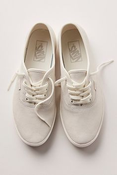 A sleek rendition of a classic skate style, this low, tapered sneaker from Vans features all-suede uppers with contrast stitching for a clean, casual look. **Features:** Low-top style, suede uppers, contrast stitching, signature rubber waffle outsoles 5 metal eyelet lace rows **Why We | Vans Authentic Lowpro Suede Sneakers at Free People in White, Size: US 5.5 M White Low Top Shoes Women, Outfits With White Tennis Shoes, Vans Cream Sneakers For Summer, White Sole Lace-up Vans Sneakers, Cream Low-top Vans Sneakers, White Suede Vans Skate Shoes, White Vans Outfit, Non-slip White Vans Sneakers, White Tennis Shoes Outfit