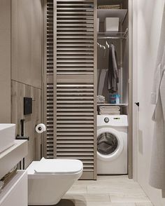 a washer and dryer in a small bathroom with wooden slats on the wall