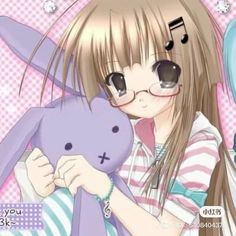 a girl with glasses holding a stuffed animal