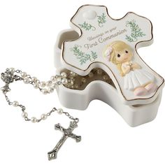 For her First Communion, give her a gift that she will use and treasure throughout her life. The unique cross-shaped box is meticulously sculpted of bisque porcelain and handpainted in expert detail. A meaningful gift, the Precious Moments set includes a silver-colored metal rosary with pearl-like beads. | Precious Moments hand sculpted porcelain box with handpainted details features a lid and includes a rosary. | On box: Blessings on your First Communion. | Rosary: Plastic and metal. | 3" W x 4" H x 1.25" D Rosary Boxes, First Communion Decorations, Communion Decorations, Golden Painting, First Communion Gifts, Communion Gifts, Bisque Porcelain, Religious Gifts, First Communion